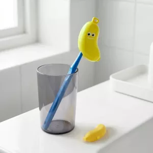 Bananen-tandenborstelhoesje en tandpasta-reisetui voor kinderen